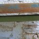 Banc repose-pieds patiné