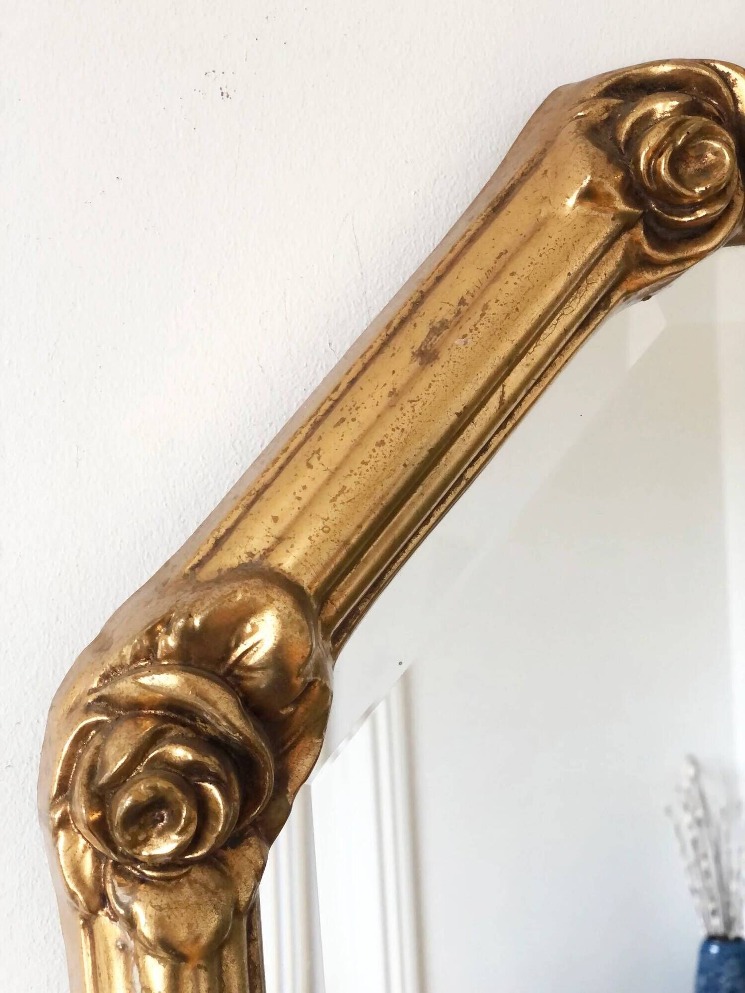 Vintage octagonal giltwood bevelled mirror with rose accents