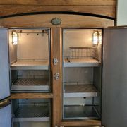 Armoire frigorifique en chêne  massif Gelkit.
