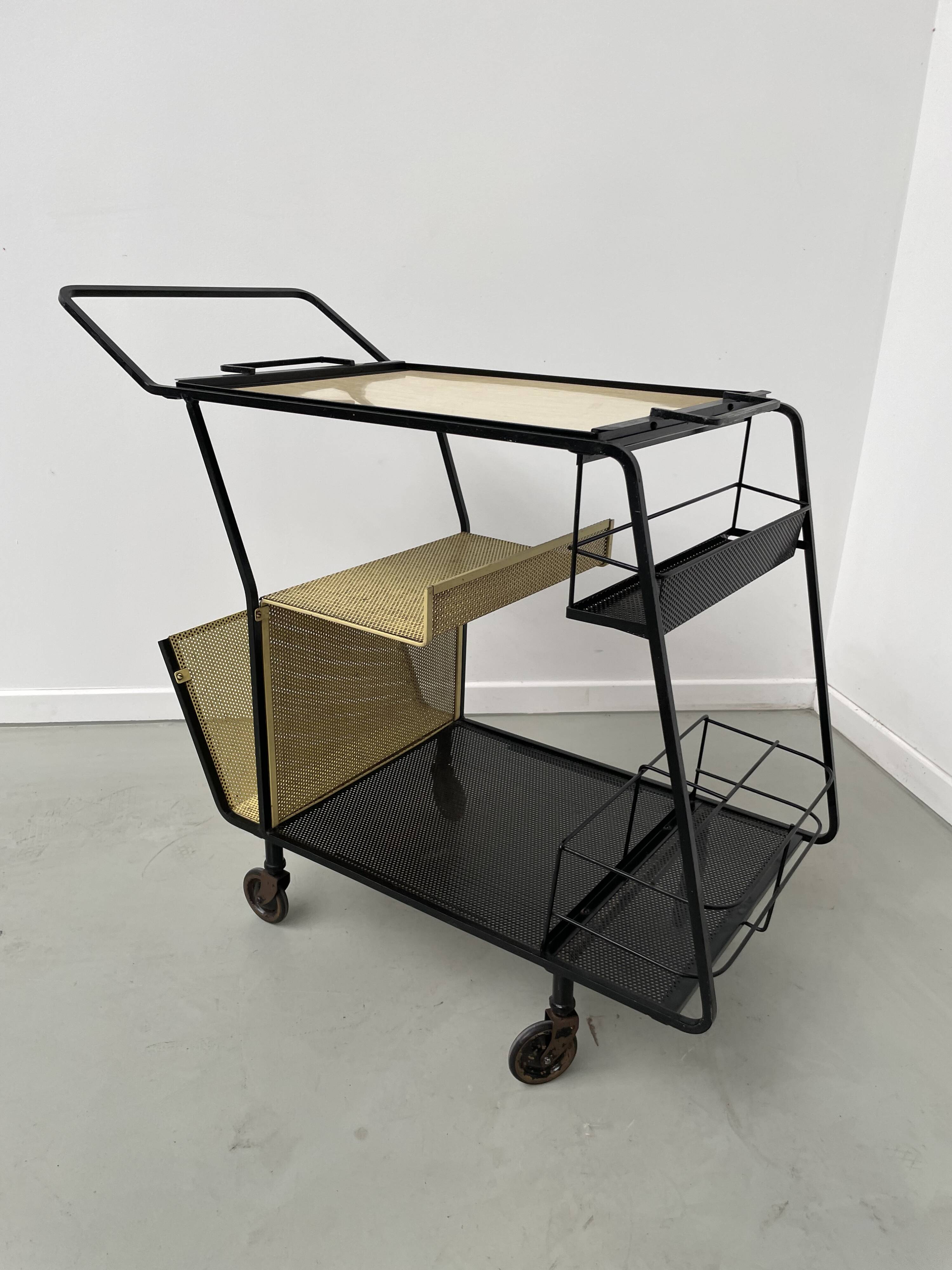 Perforated metal serving trolley in the Mathieu Matégot style