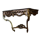Transitional console in carved and gilded wood, France, 18th century