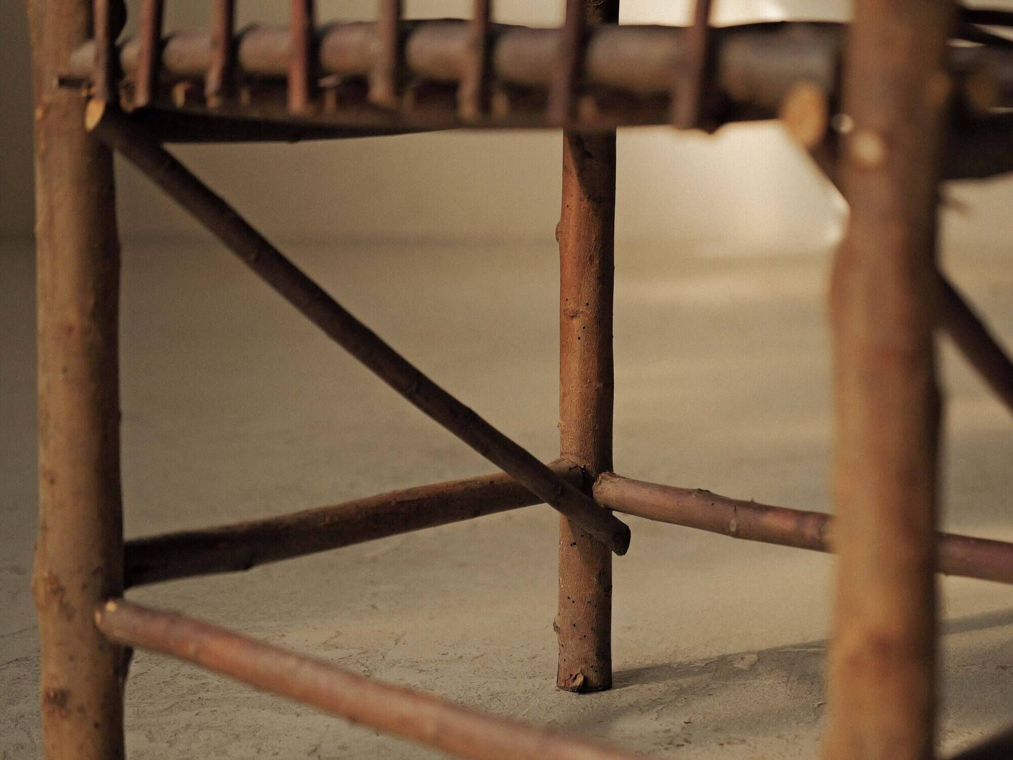 Brutalist armchair made of hazel branches, circa 1970.