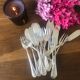 8 mismatched fish forks, silver metal
