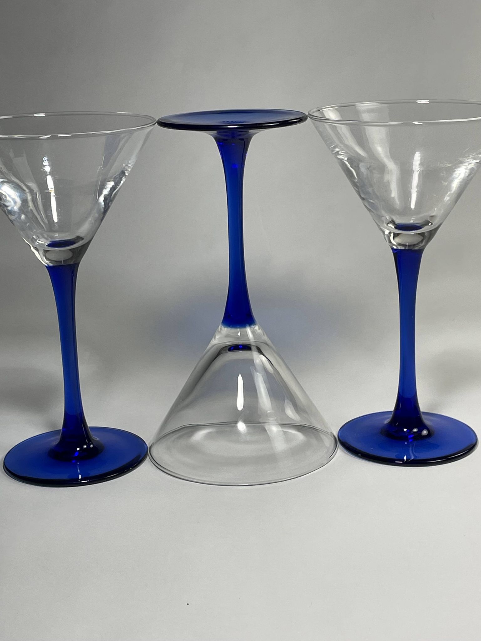 Set of 9 blue stemmed glasses (3 balloon wine glasses, 3 flutes, 3 cocktail)