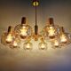 Large designer chandelier in brass and smoked glass globes, 1970s
