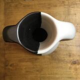 Black and white Vallauris vase with H. Caillet flower
