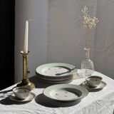 Set of 9 vintage turquoise deep plates with gold trim and pink flowers.