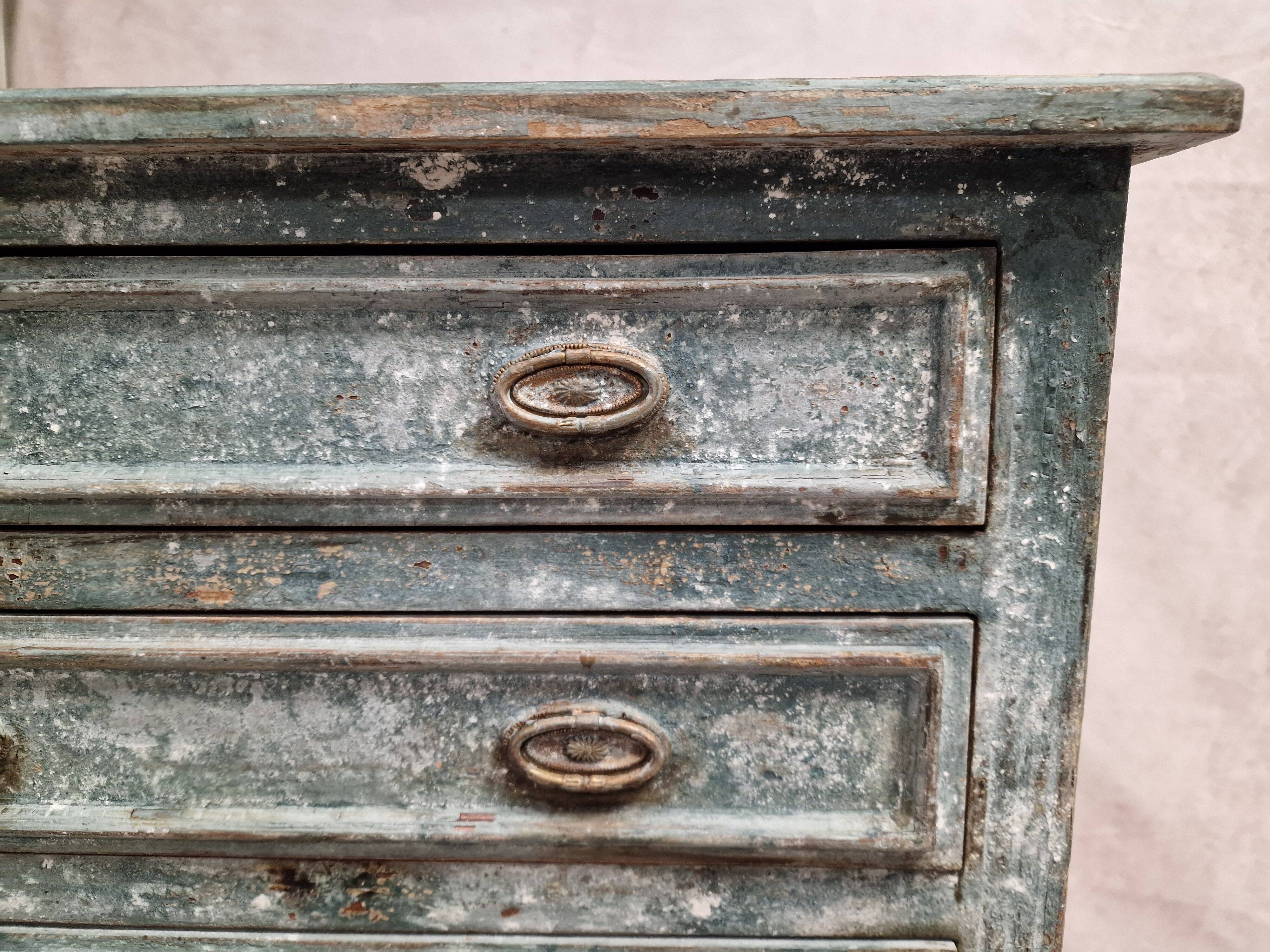 Small patinated chest of drawers
