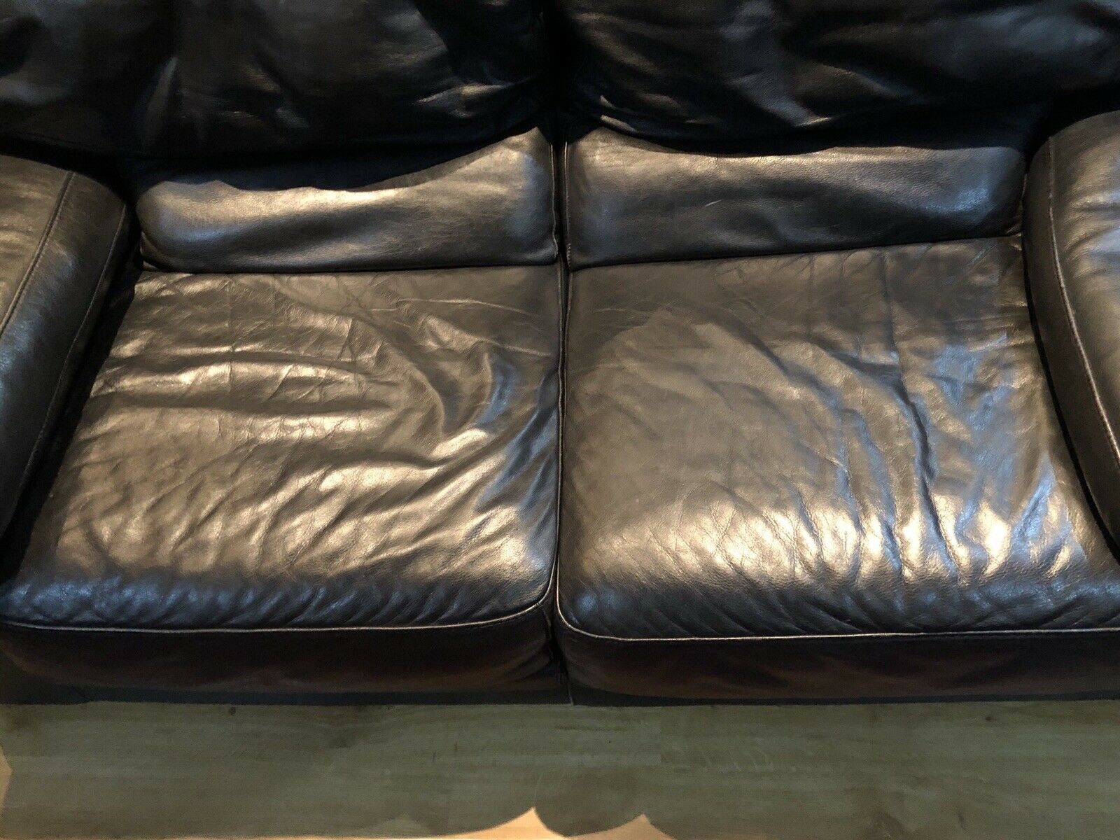 Pair of 2-seater sofas in black leather Roche & Bobois