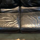 Pair of 2-seater sofas in black leather Roche & Bobois