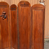 Art Deco screen with 7 panels carved with the insignia of the Foreign Legion, circa 1940