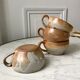 Lot of 4 coffee cups in sandstone