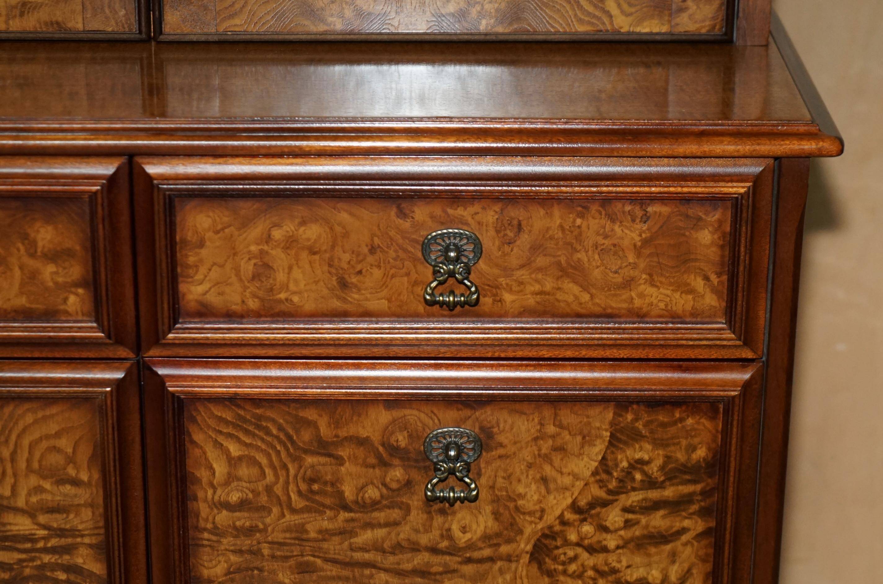Vintage walnut burr buffet with glass and lighting, Art Deco style.