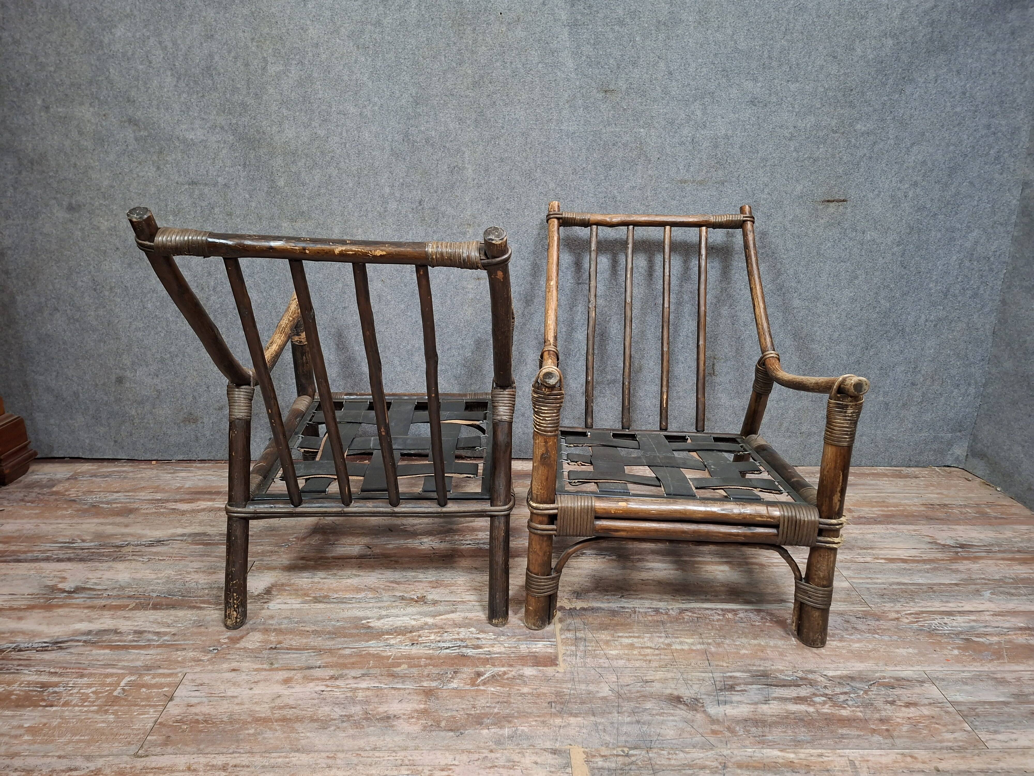 Pair of low bamboo armchairs with an exotic spirit, dating from the early 20th century.