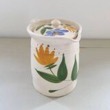 Old earthenware pitcher with its lid