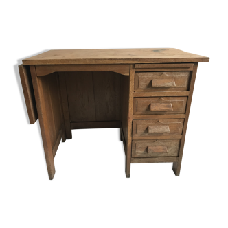 Accountant in solid wood desk