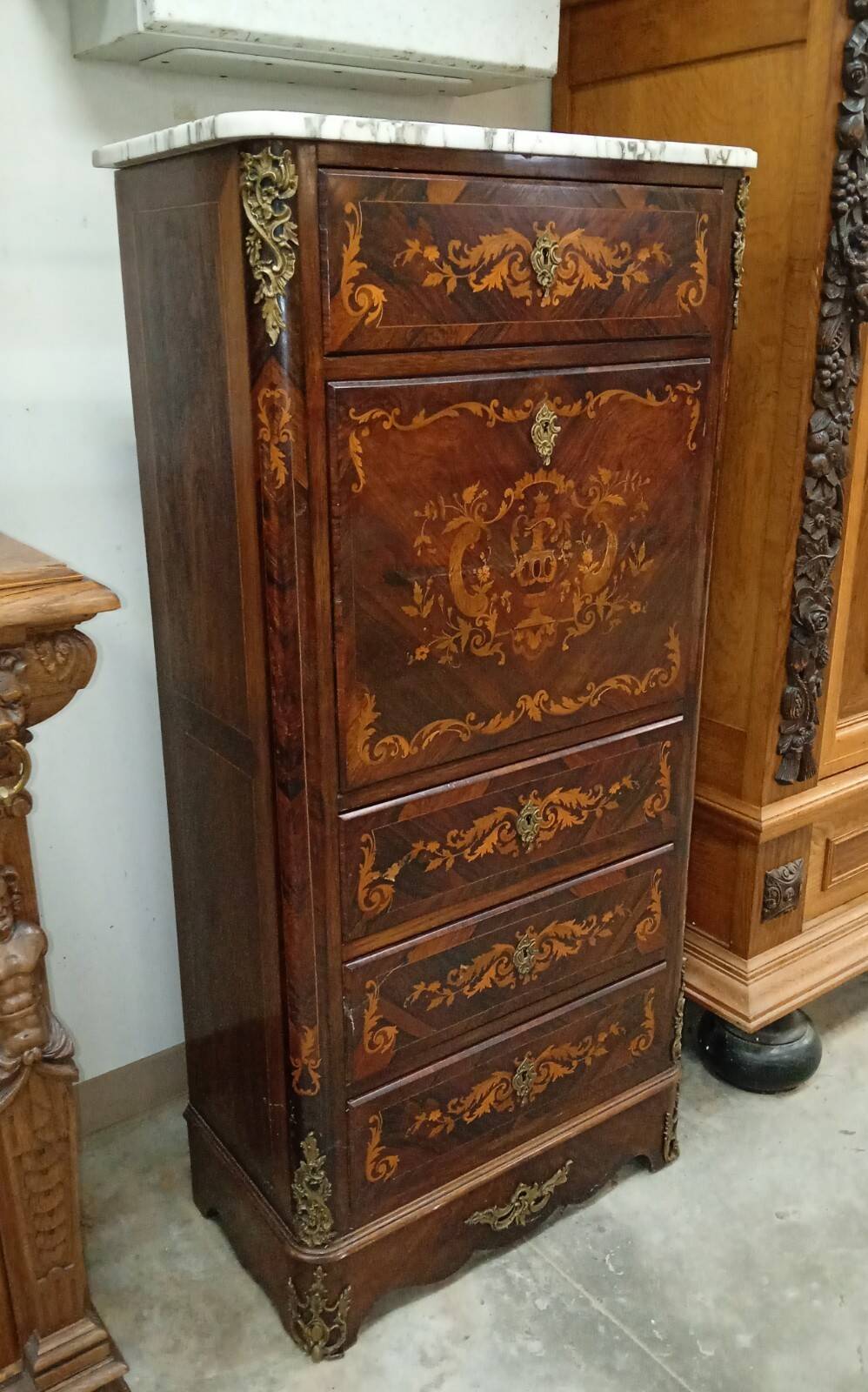Secretary with a drop-leaf in precious marquetry wood in the Louis XV style.