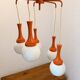 Suspension cascade design Space age orange vintage from the 70s.