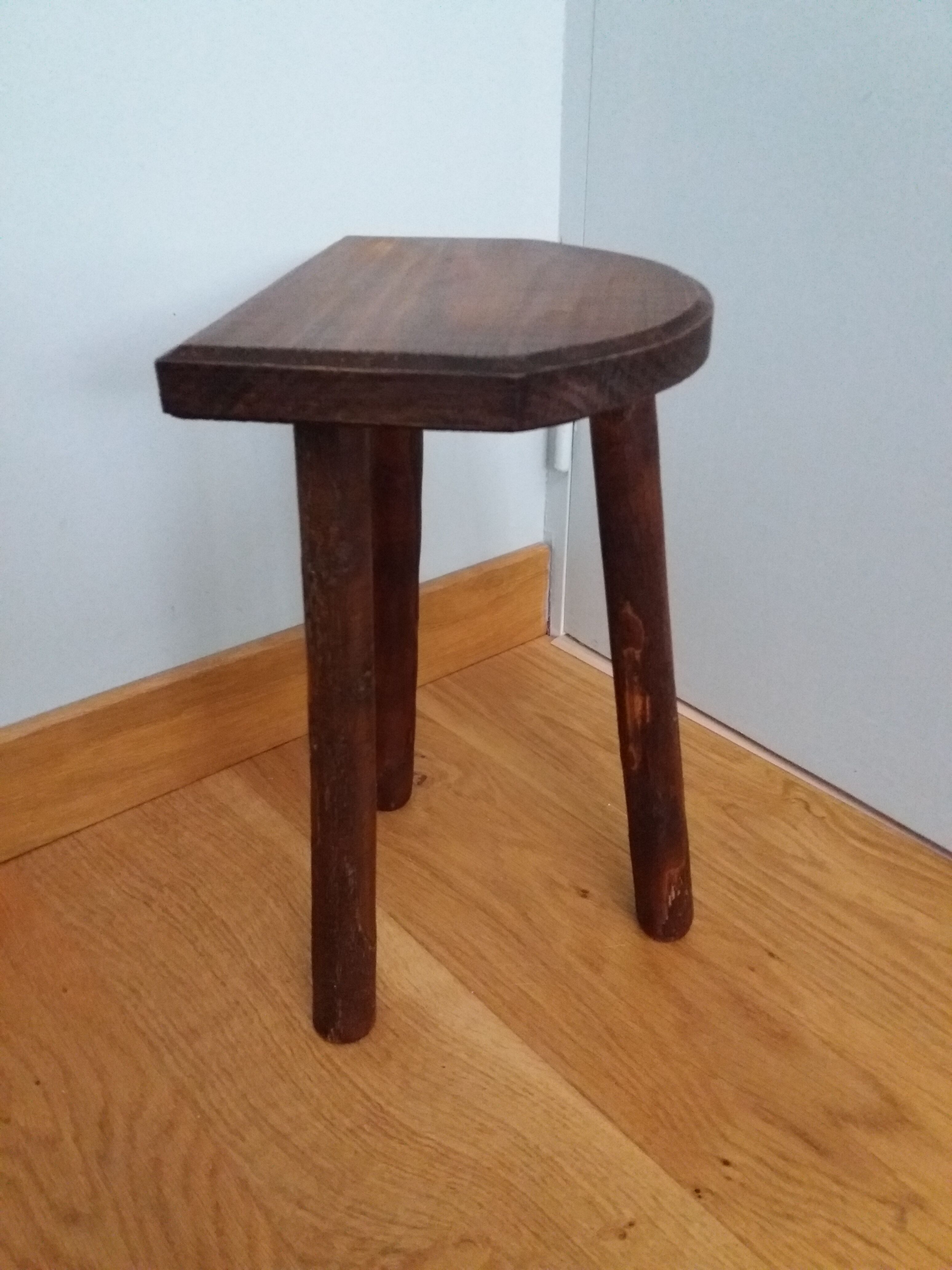 Tripod stool cowherd end of sofa