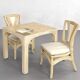 1970s rattan table with stone marquetry and matching chairs.