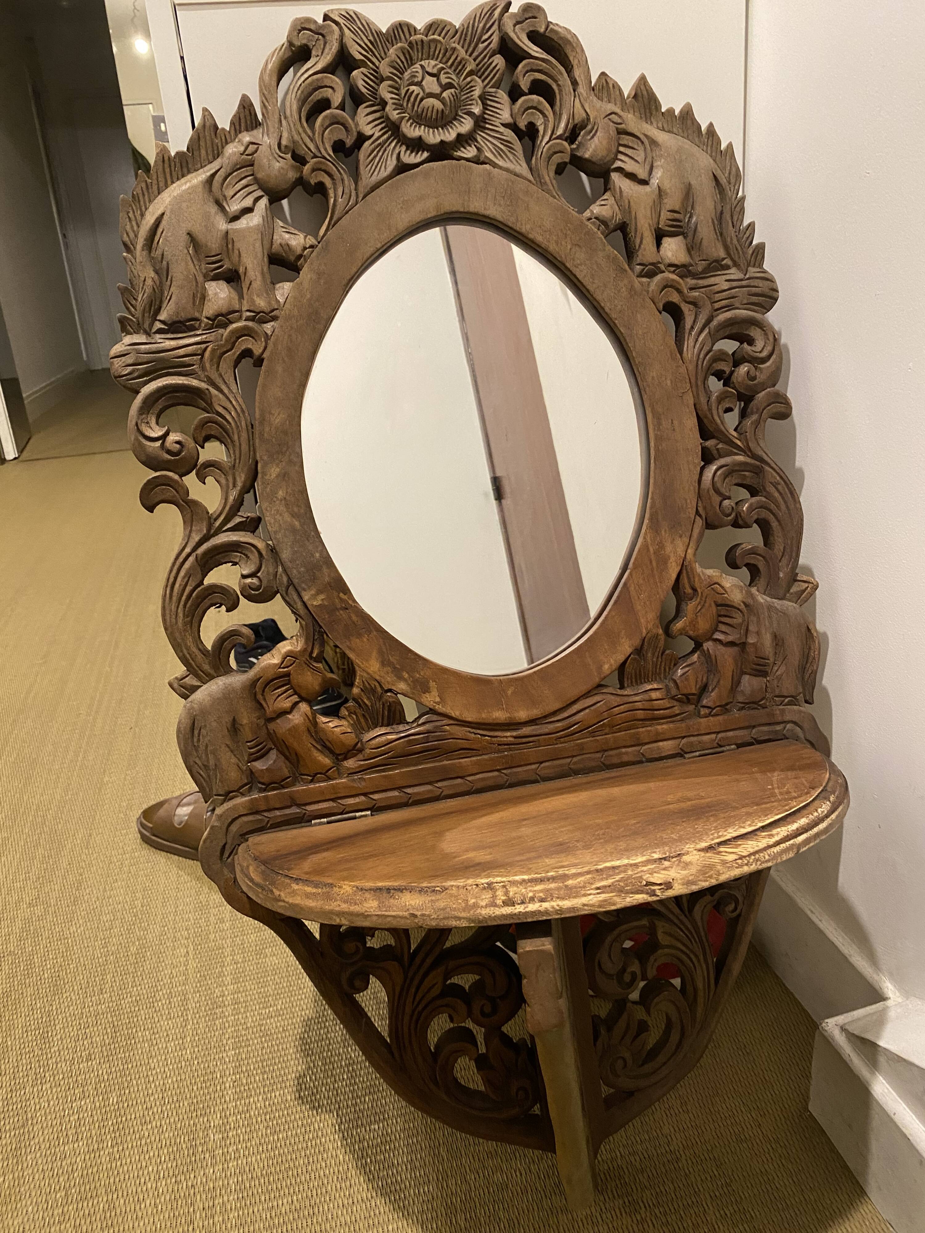 Carved mirror with integrated shelf