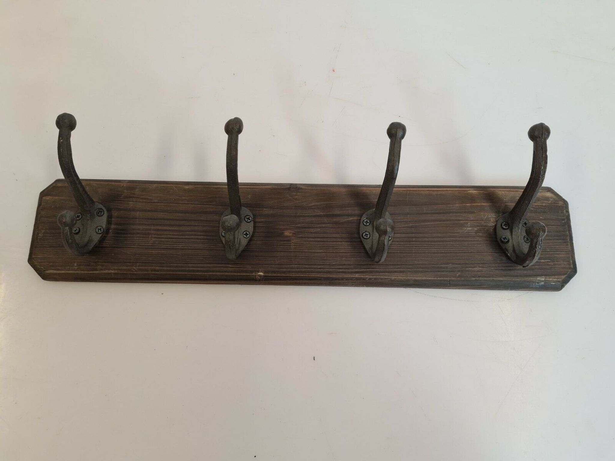 Wooden school coat rack with cast iron hooks