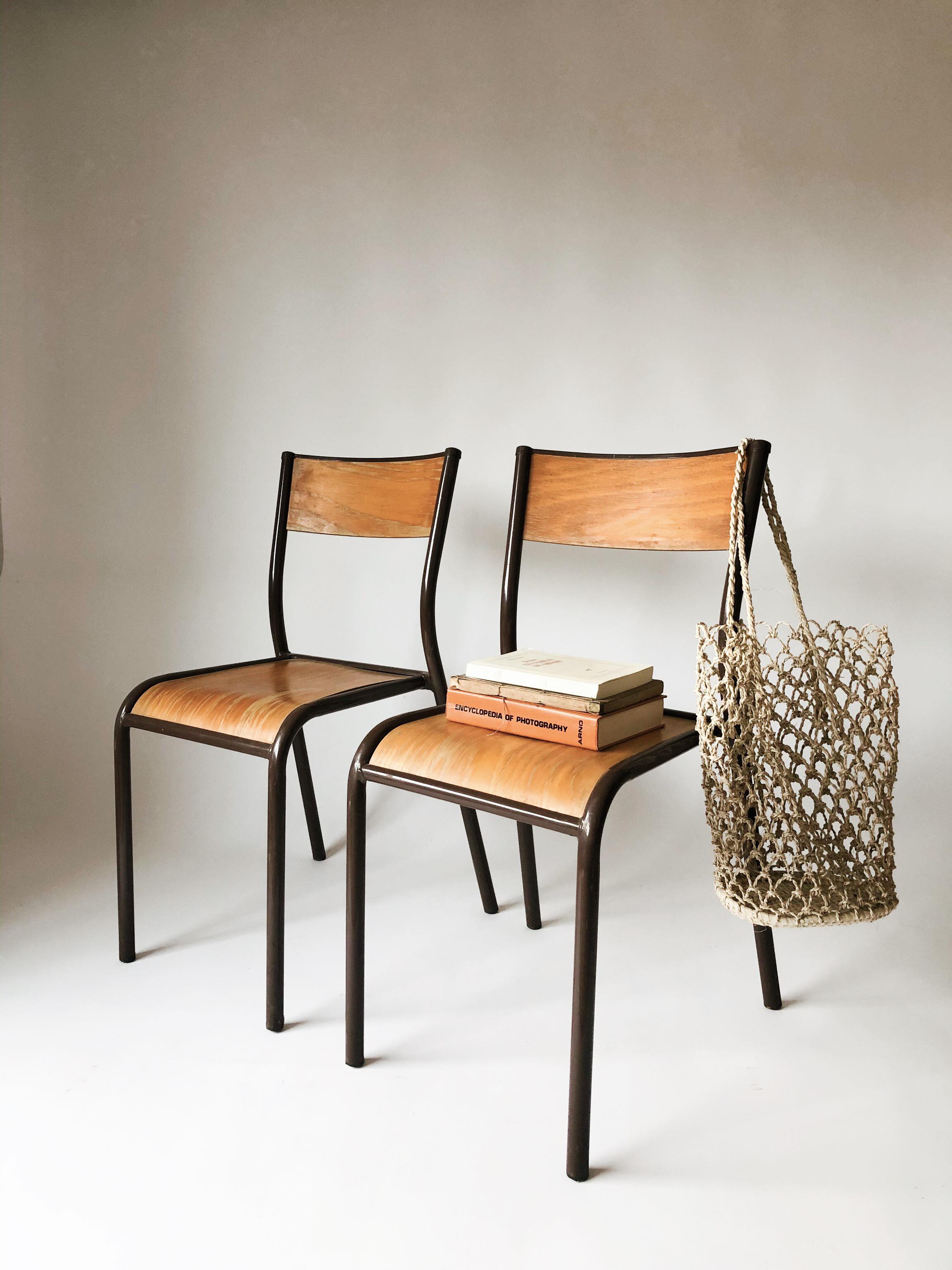 Pair vintage school chairs
