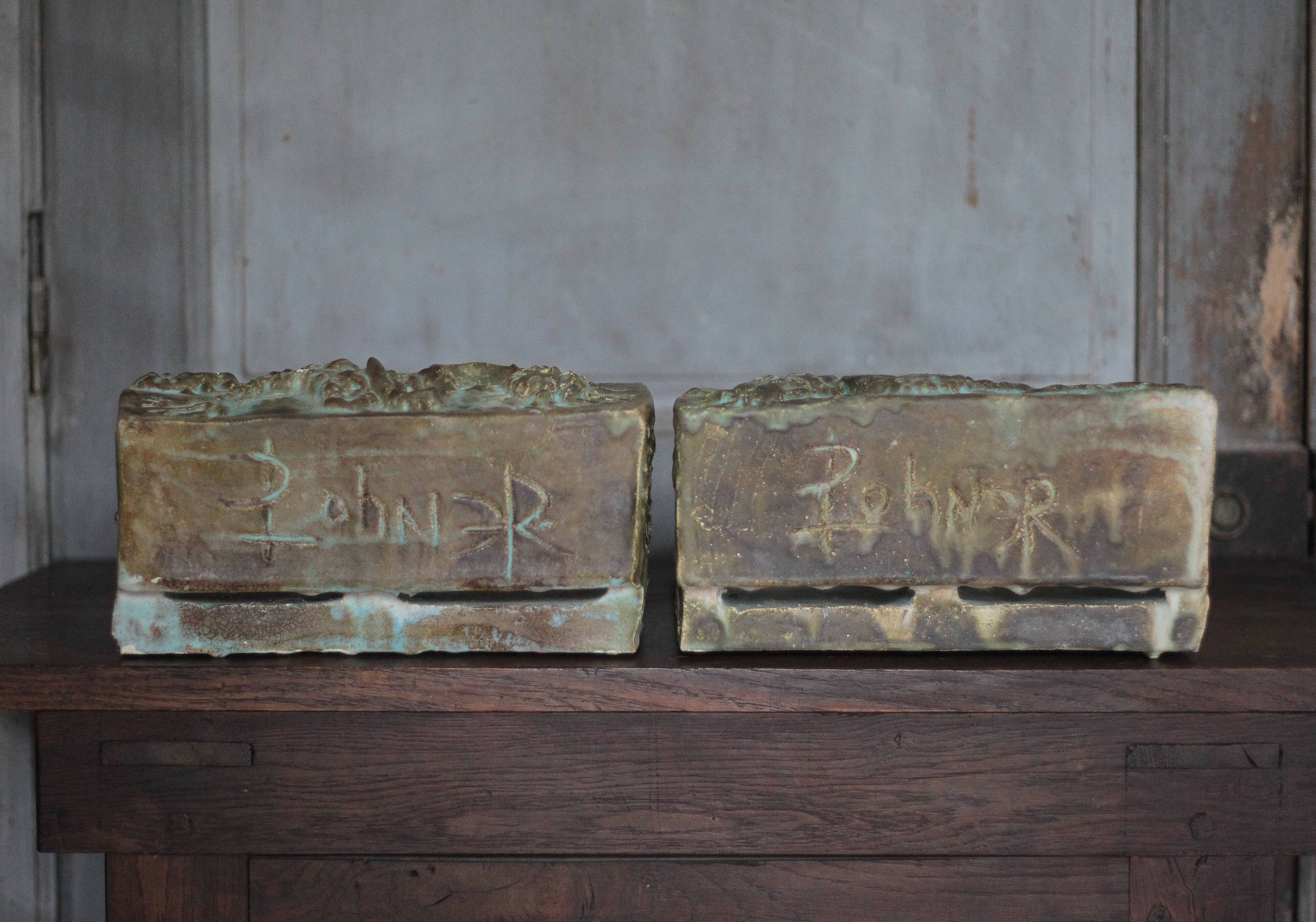 Pair of signed ceramic wall planters, pot cover