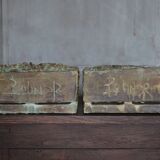 Pair of signed ceramic wall planters, pot cover