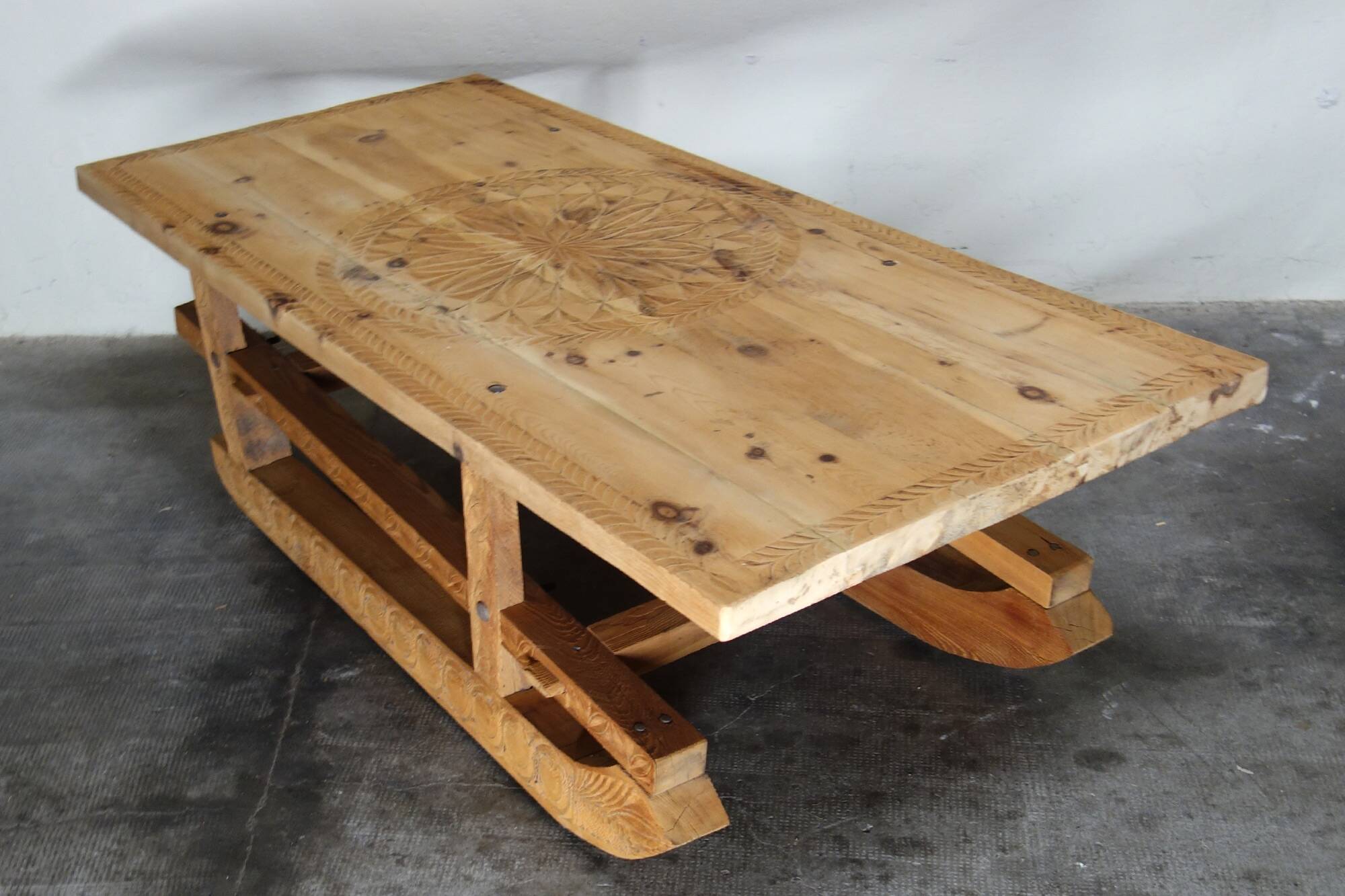 Large 19th century sculpted sled coffee table, folk art, France