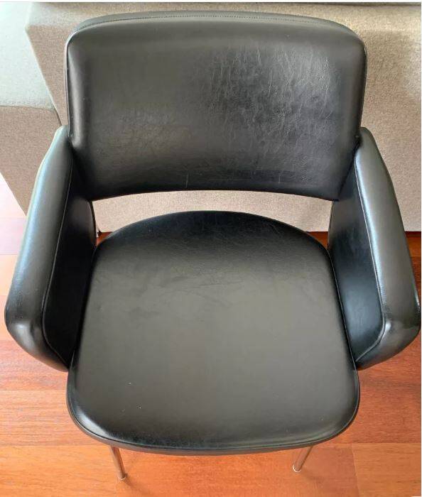 Black leatherette conference armchair