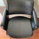Black leatherette conference armchair