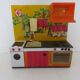 Kitchen doll, child in tole 70s