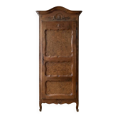 Armoire bonnetière ancienne en bois sculpté style Classique