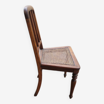 19th century children's chair in wood and canework.