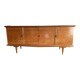 Vintage 4-door buffet with wood veneer and glass top.