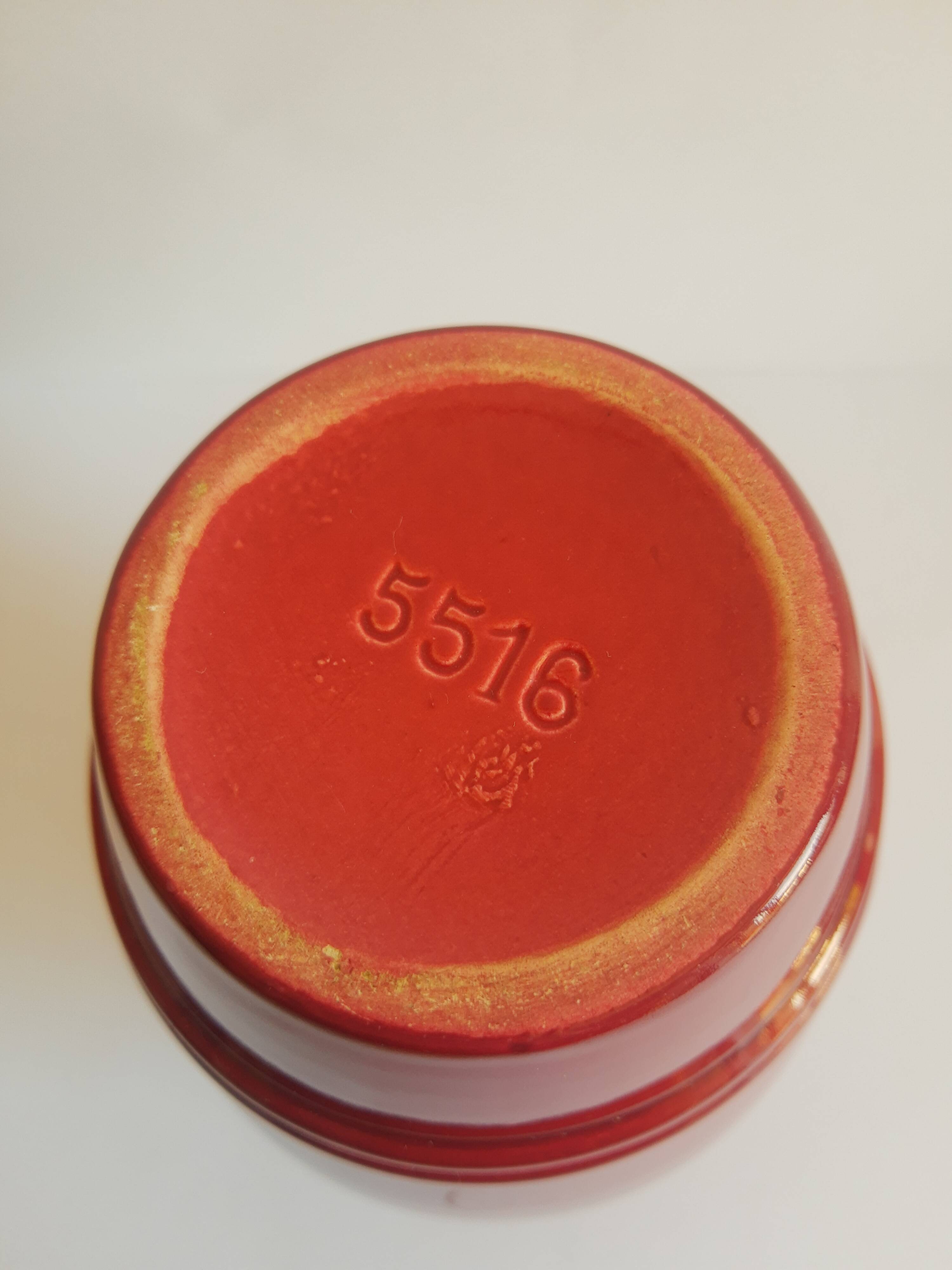 Old vintage numbered art deco red vase