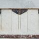 Central island shop counter in marble and oak, Art Deco period.