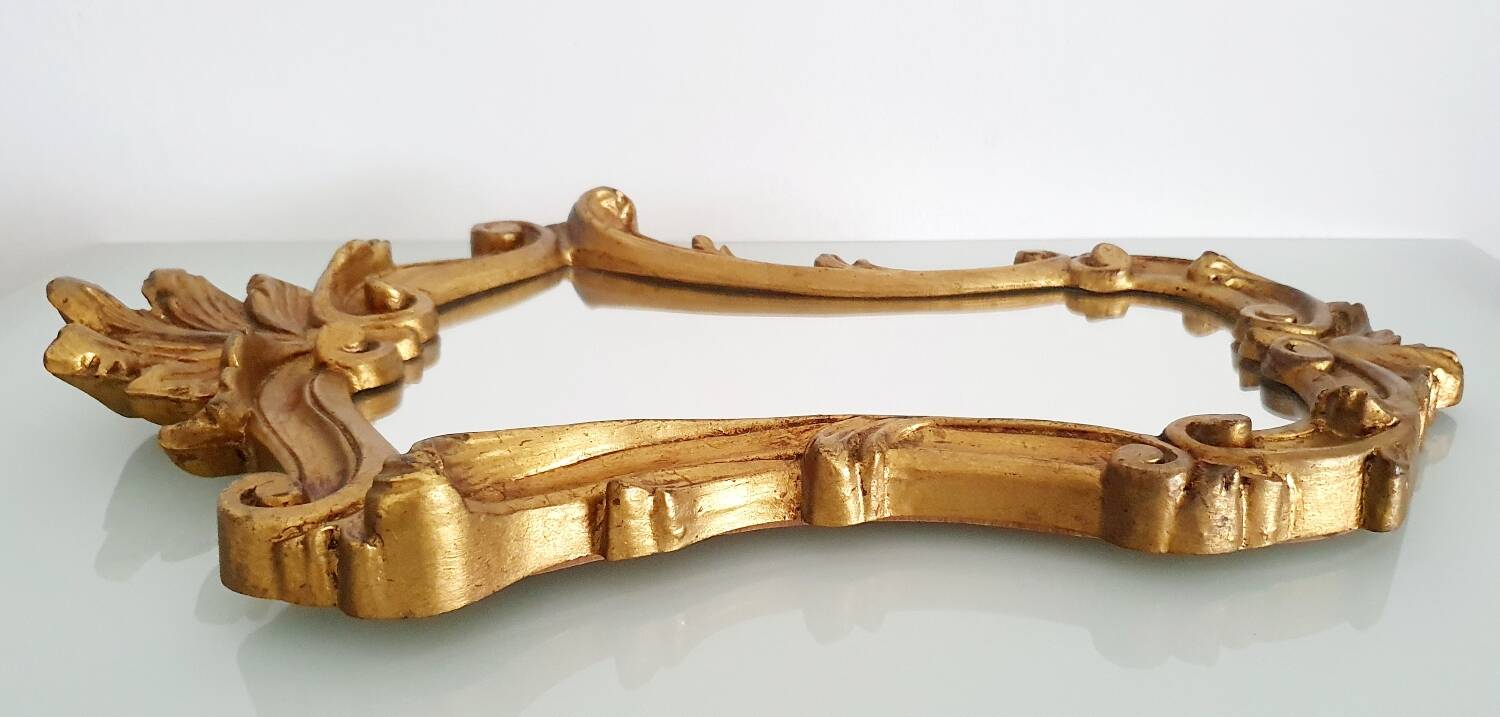 Baroque mirror gilded with gold leaf