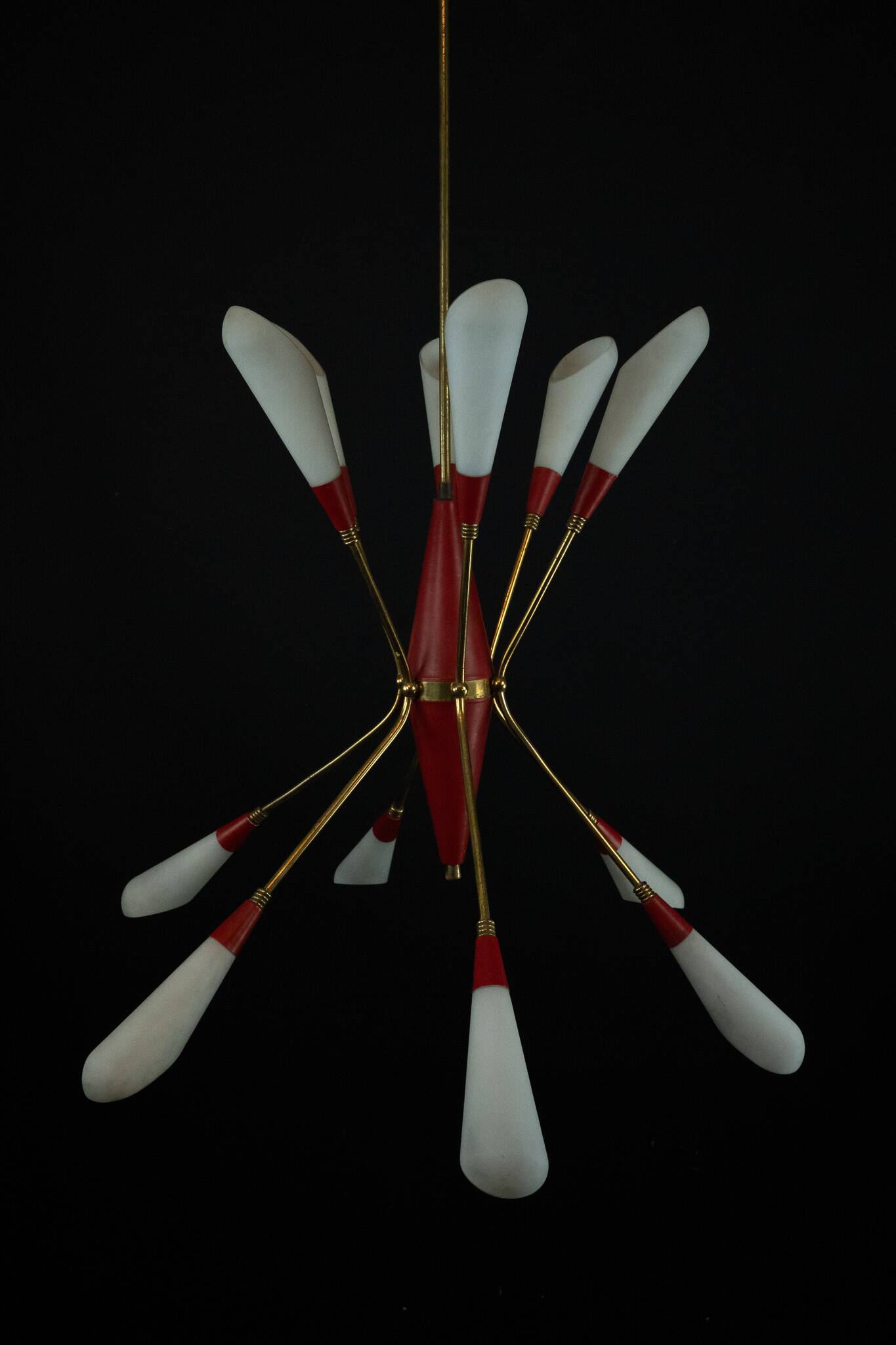 Mid-Century 12 lights chandelier in the manner of Stilnovo. Italy 1950s