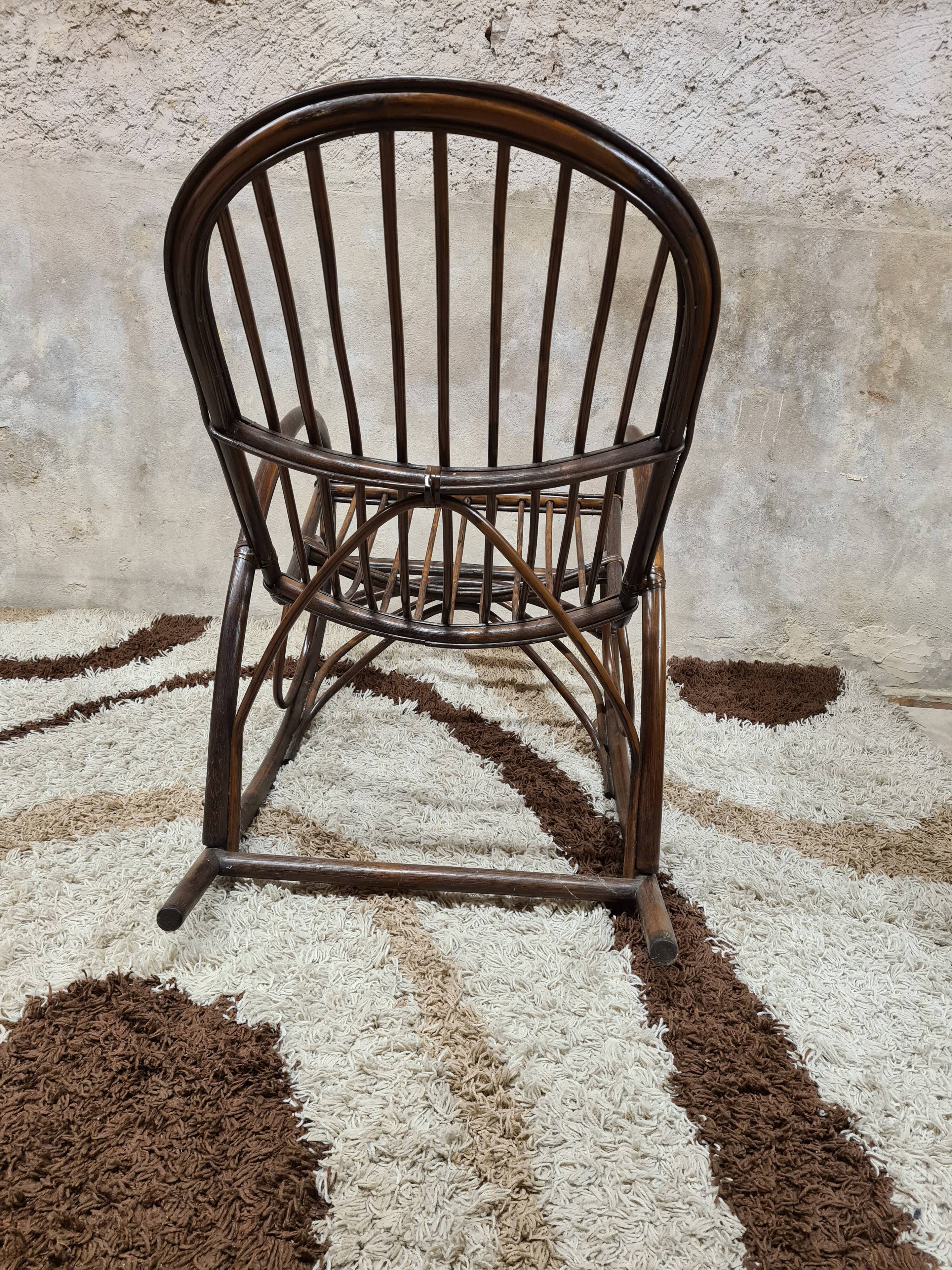 Rocking-chair in rattan bamboo 1970 vintage