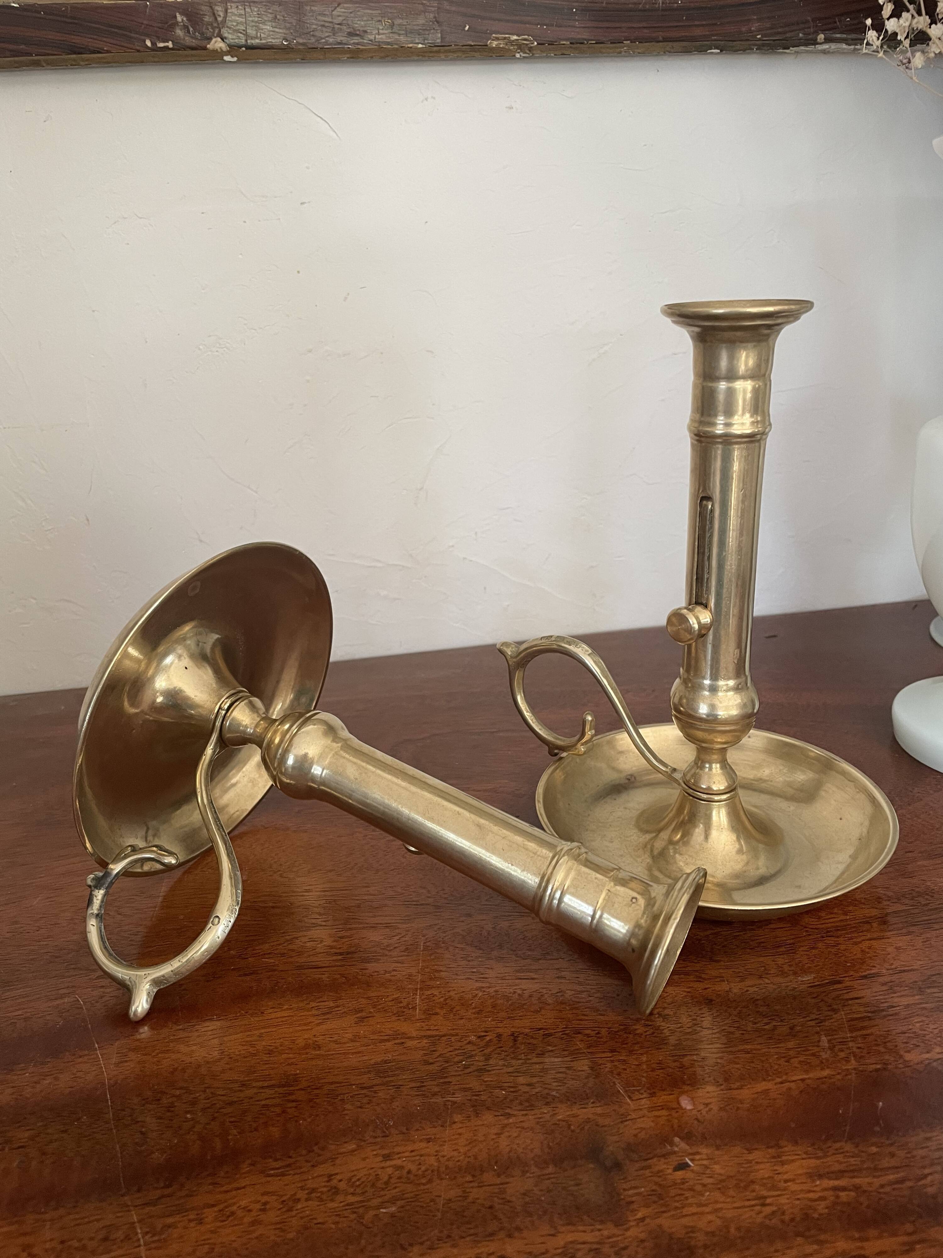 Pair of brass candle holders