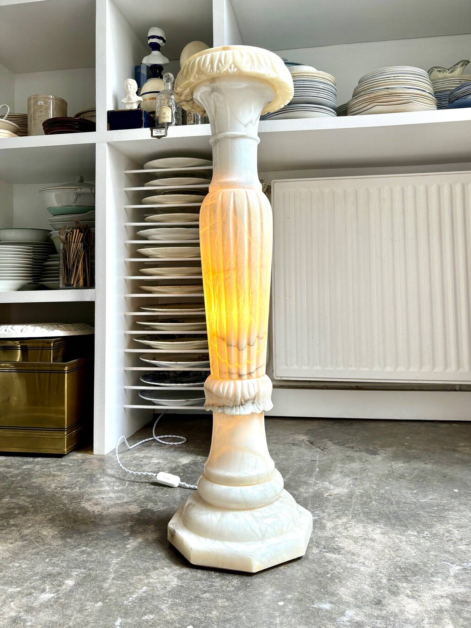 Column, illuminated alabaster saddle