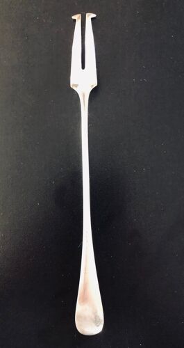 Silver metal condiment fork