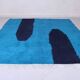 Handmade artisan rug in beige, size 150x250 cm.