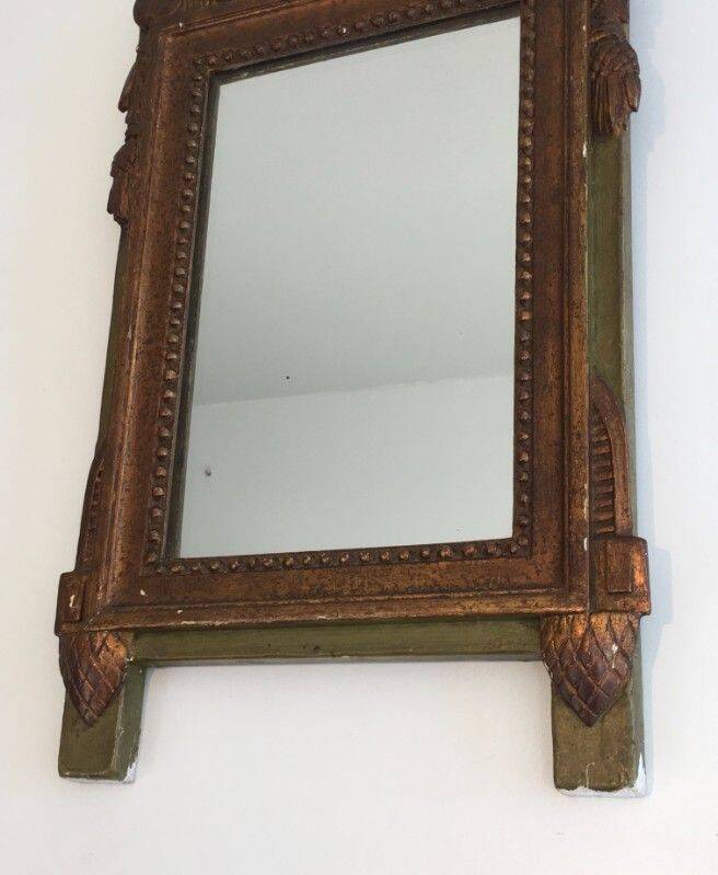 Louis XVI style mirror in patinated and gilded wood