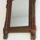 Louis XVI style mirror in patinated and gilded wood