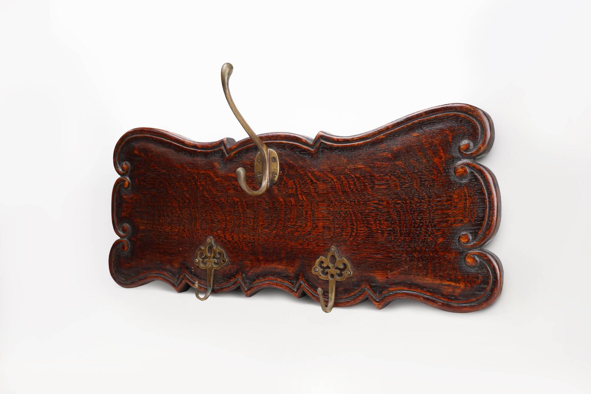 Art Nouveau style coat rack in oak with brass hooks, France ca. 1915