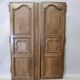 Pair of Louis XV walnut doors with medallion