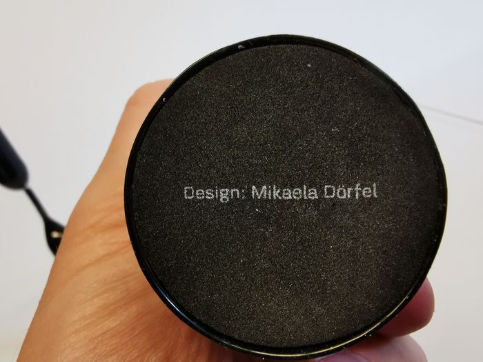 Set of two black design candlesticks, designed by mikaela dörfel for menu, denmark.